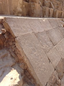 This is a bit of the original exterior of the pyramid. Most of the original smooth exterior fell off during a large earthquake. Those stones were then used on buildings in the city. One of the pyramids has a cap on the top that remained in-tact. 